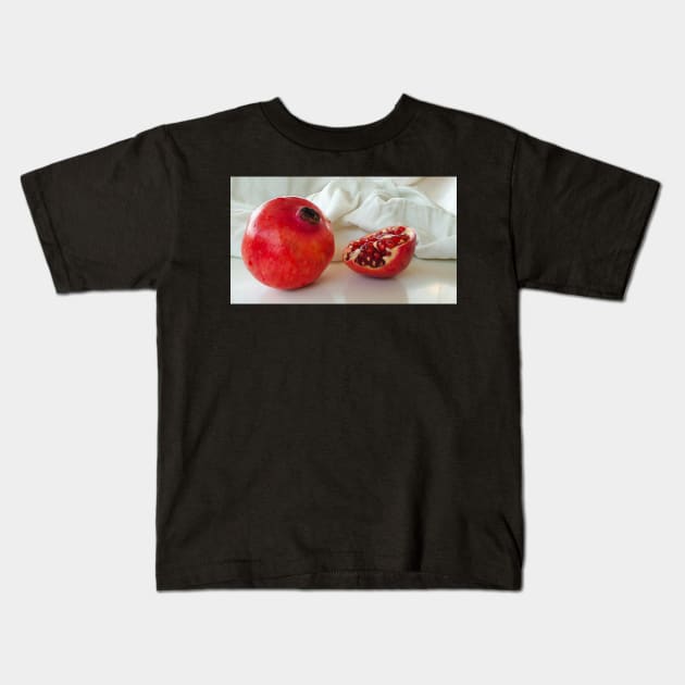 Red Pomegranate Kids T-Shirt by sigdesign